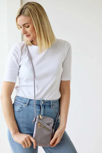 Model wearing Metallic Silver Long Cross Body Shoulder Strap Bag By Archer House Available at Beetees Nelson
